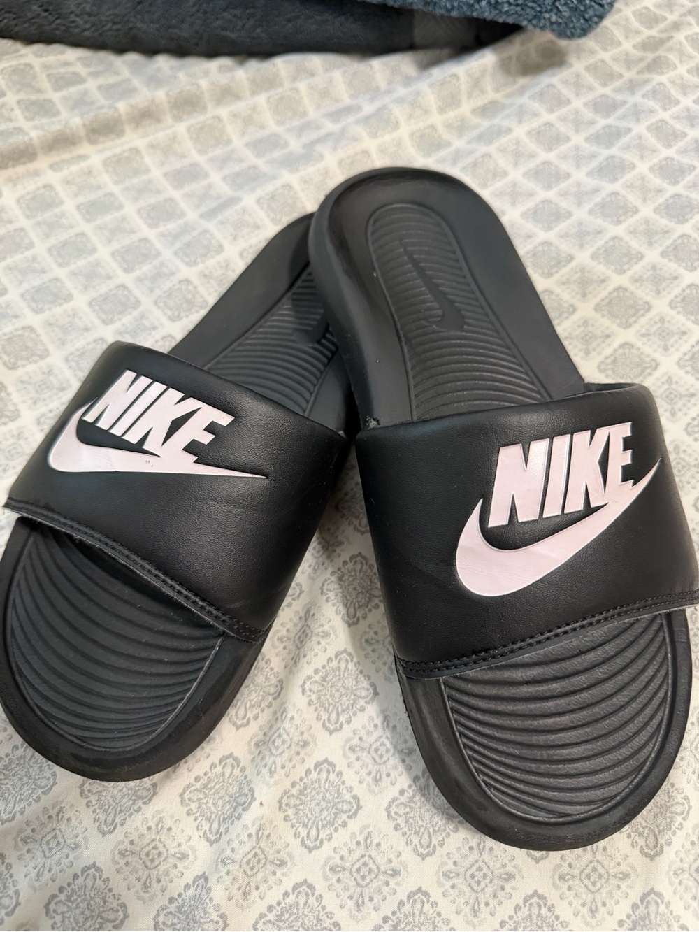 Nike Black Slide Sandals with White Swoosh Logos